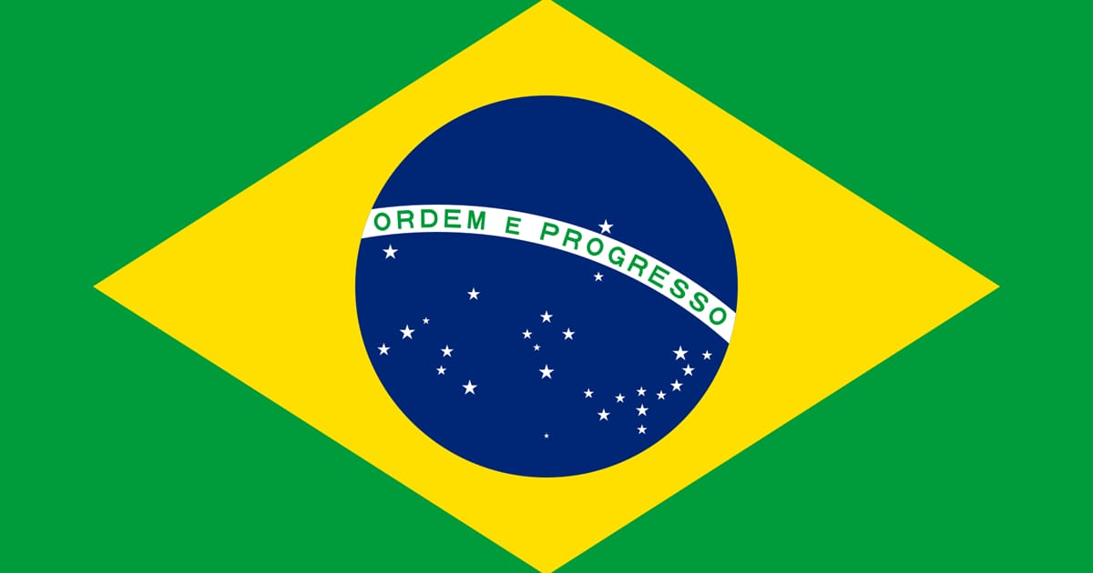 Brazilian flag featuring a green background, a yellow diamond, a blue circle with stars, and the national motto "Ordem e Progresso."