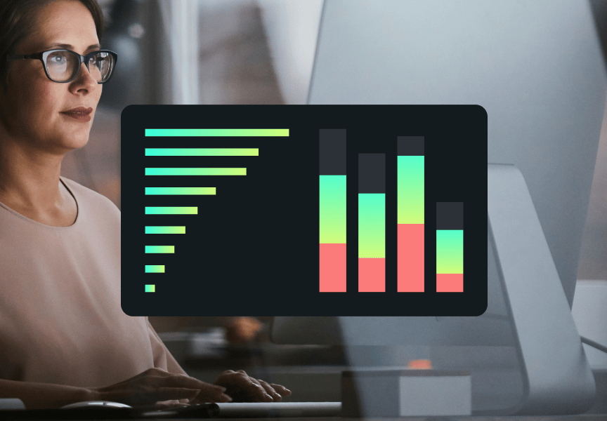 Woman analyzing data displayed on a computer screen, featuring colorful bar graphs and charts.